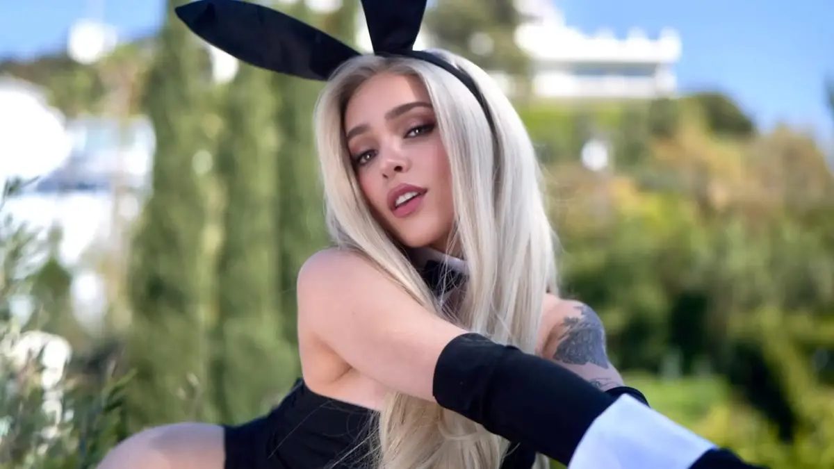 Darla Eliza in a black Playboy Bunny outfit.