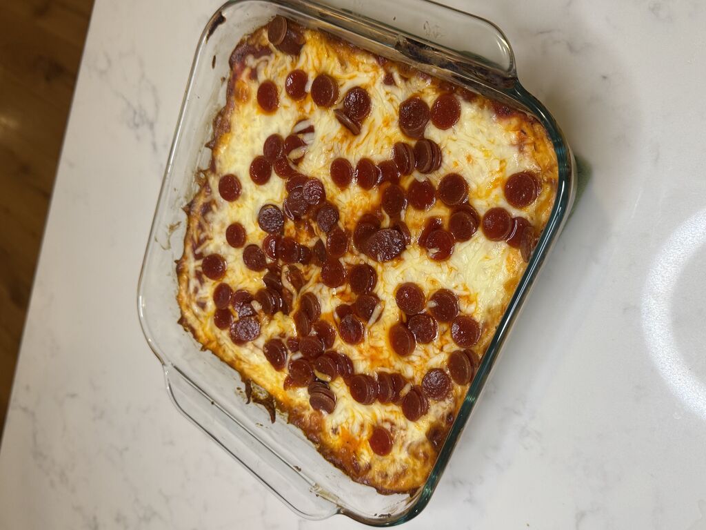 Playboy Club model Kindly Myers makes pepperoni pizza dip for upcoming Super Bowl LIX between the Kansas City Chiefs and Philadelphia Eagles.