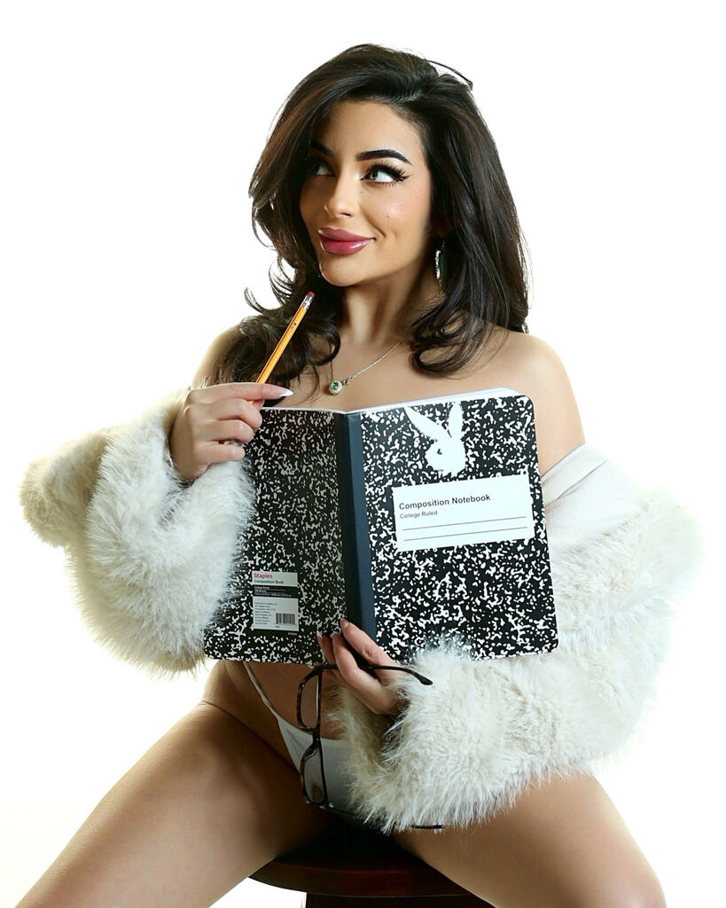 Playboy Club creator Christina Enaa is a talented poet and designer who loves Superman.