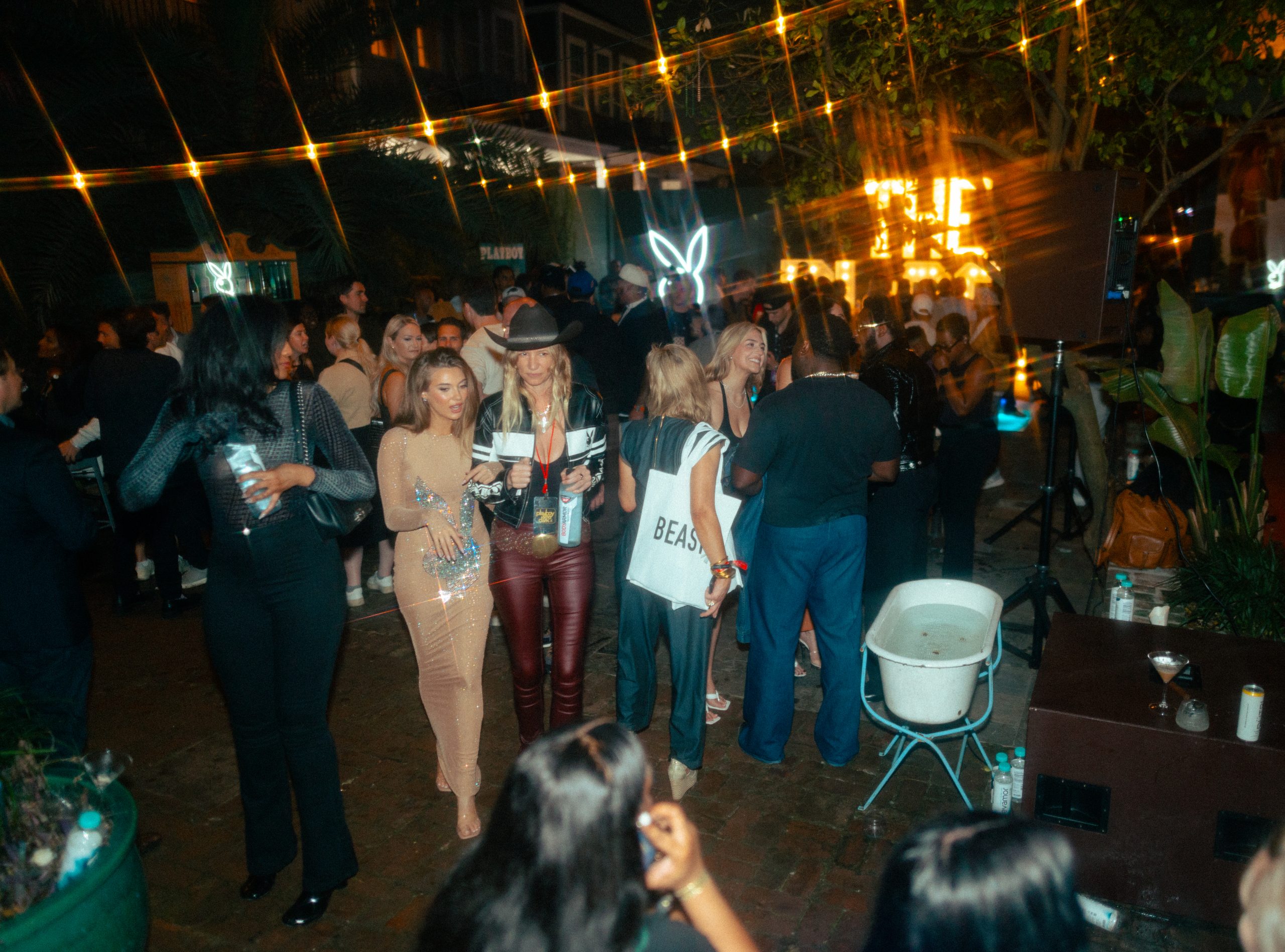Attendees enjoying the festivities at the PLAYBOY Big Game party
